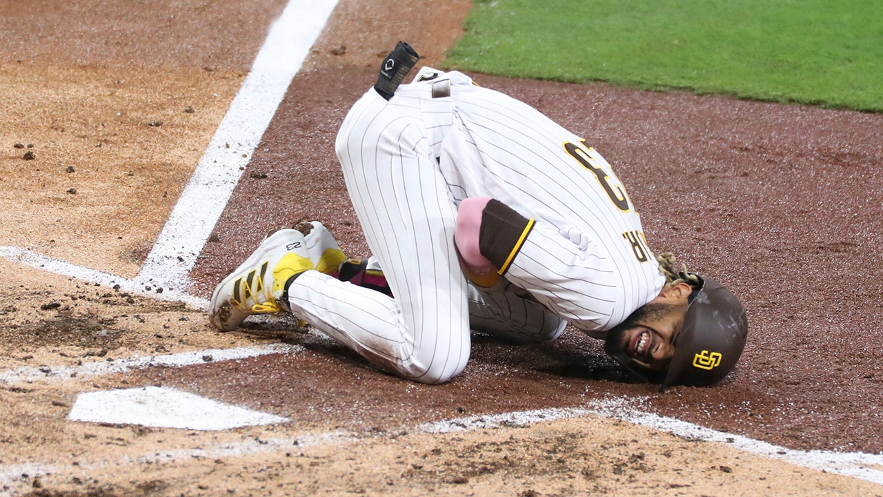 Tatis Jr. on the “bike chain” around his neck