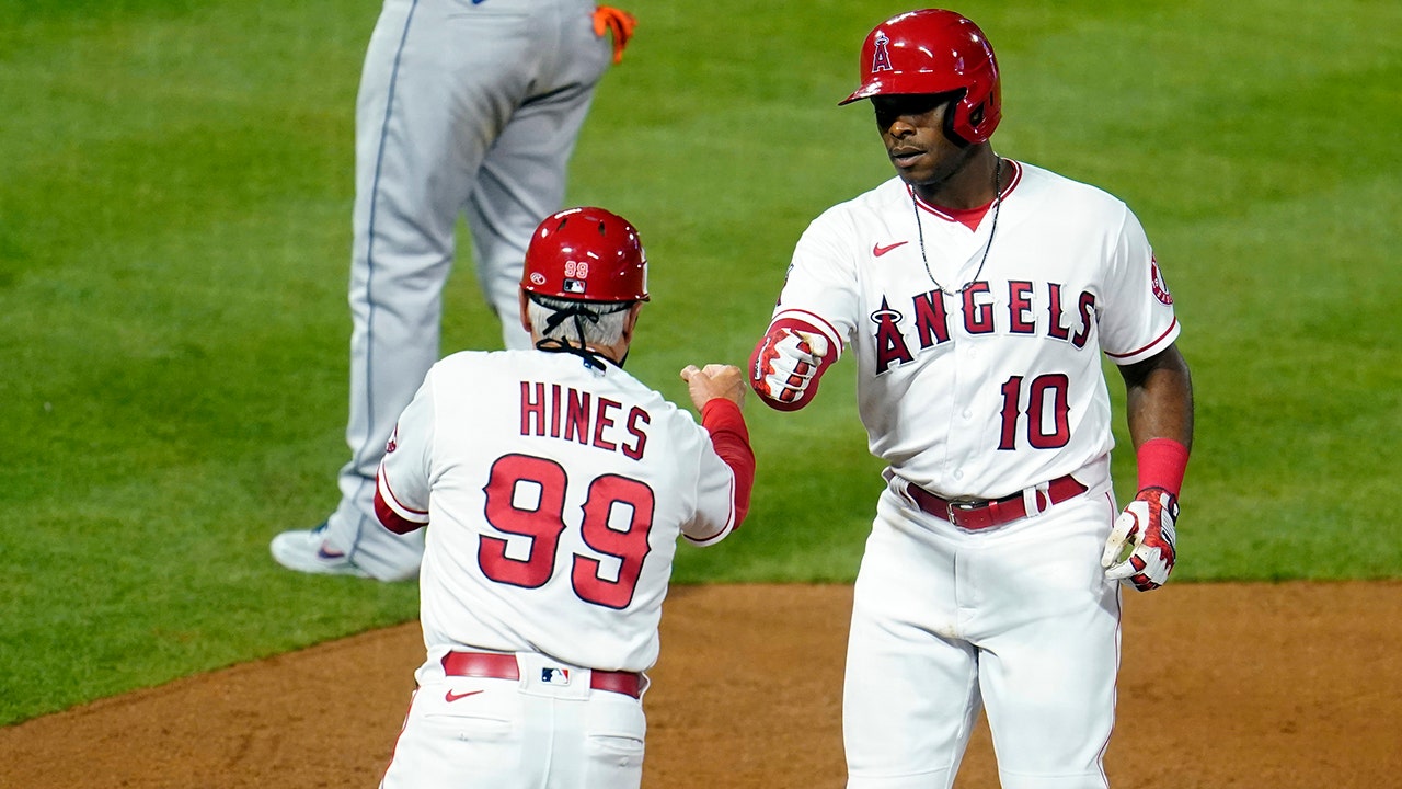 Angels fans let garbage cans fly during the game against Astros