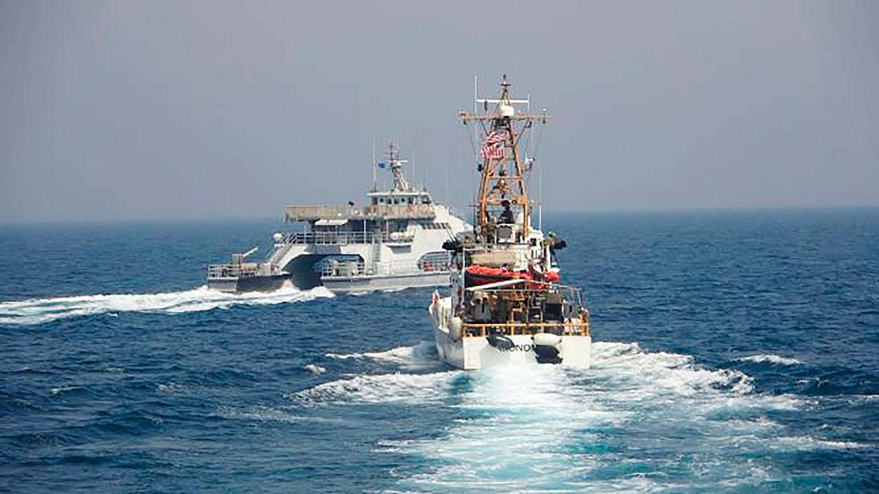 U.S. Navy fires warning shots on three Iranian fast boats that got too close