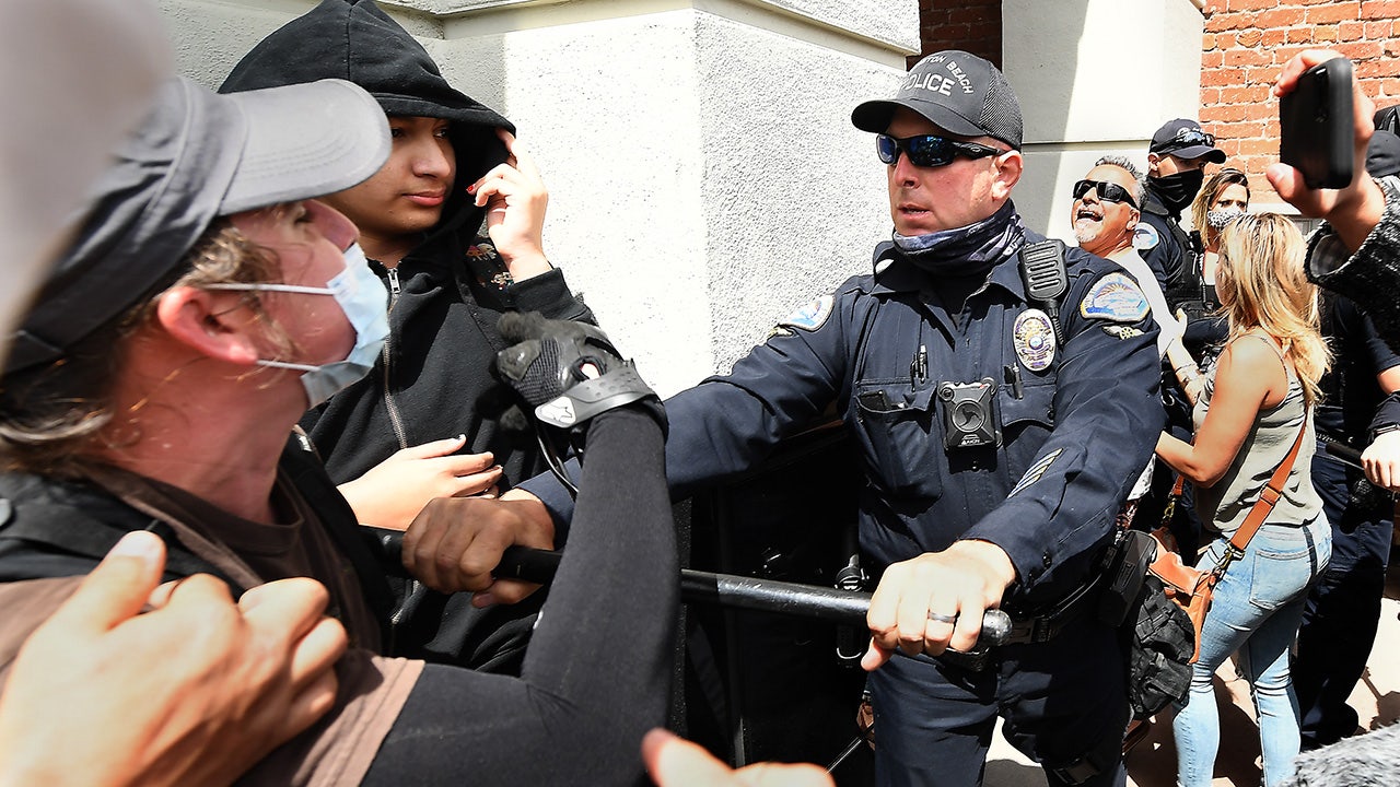White Lives Matter rally in California leads to 12 arrests, clashes with protesters