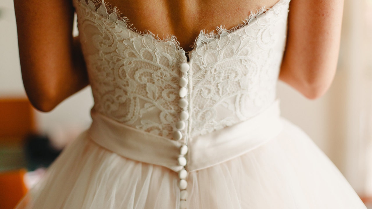 Baltimore bride wears wedding reception dress to get COVID-19 vaccine