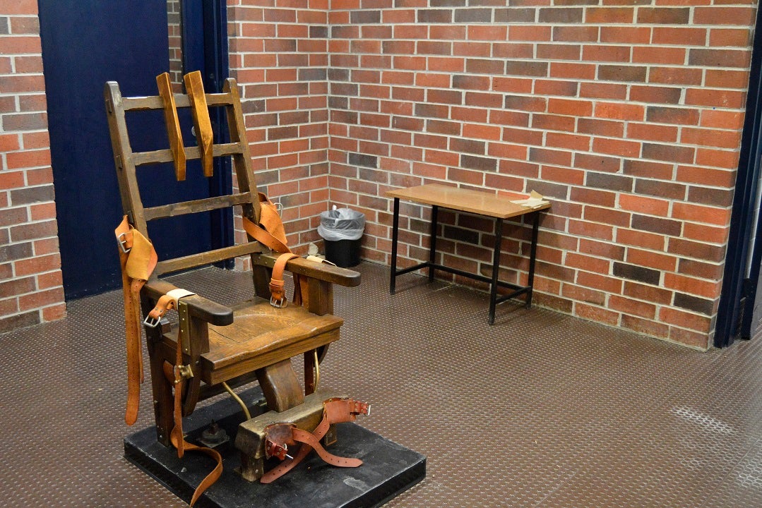 New law makes inmates choose electric chair or firing squad