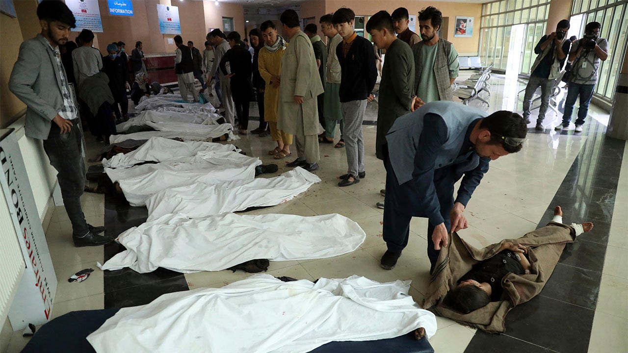 Bomb kills at least 30 near girls' school in Afghan capital