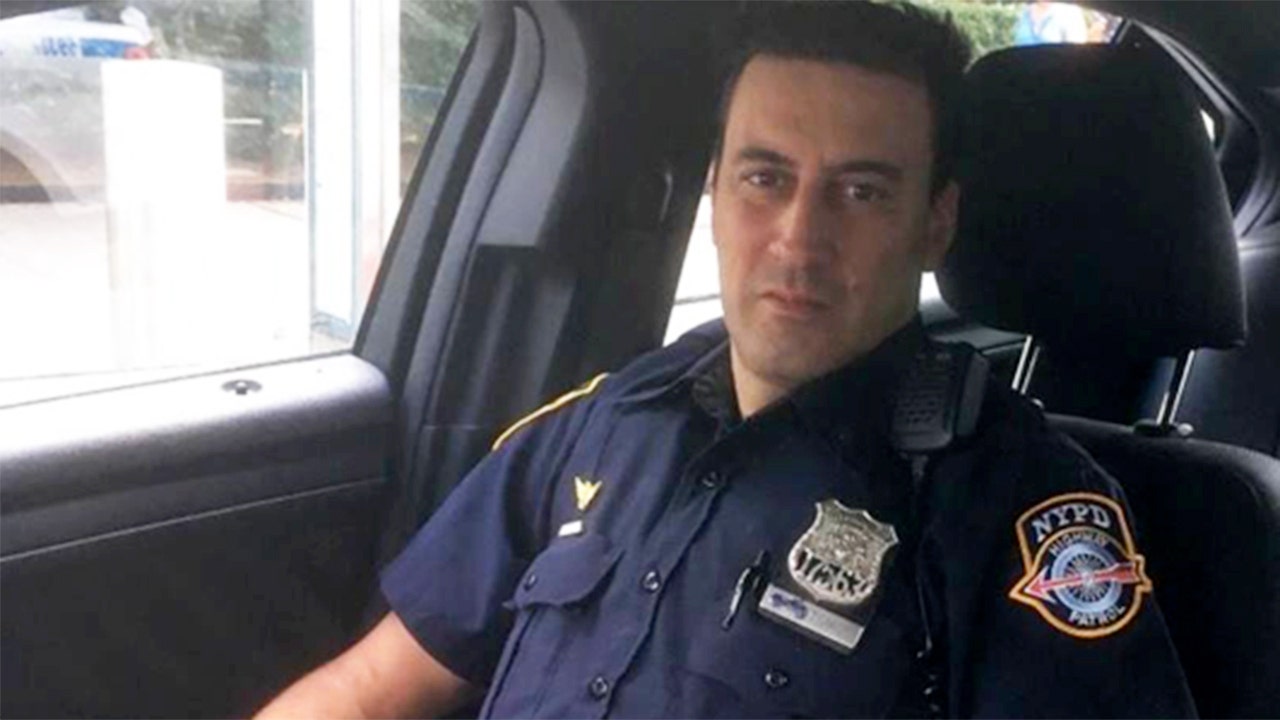 Charity pays off mortgage for family of fallen NYPD officer