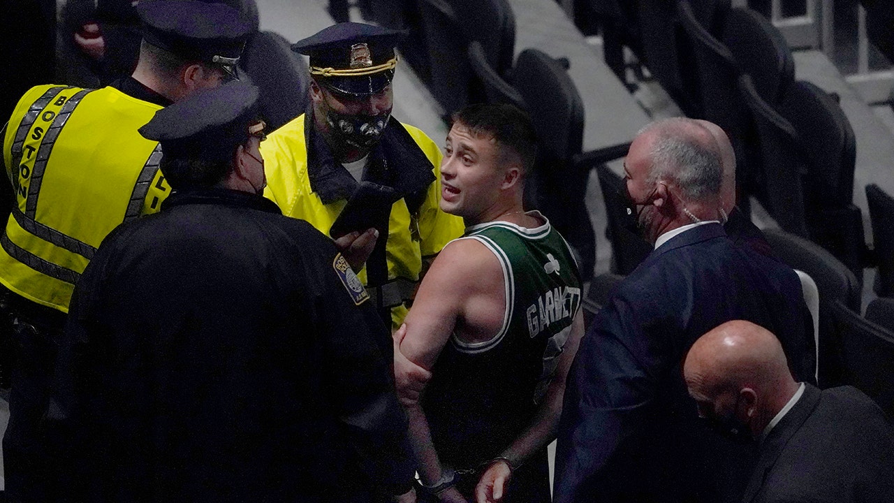 Celtics fan who appeared to throw water bottle at Kyrie Irving identified, facing charges - Fox News