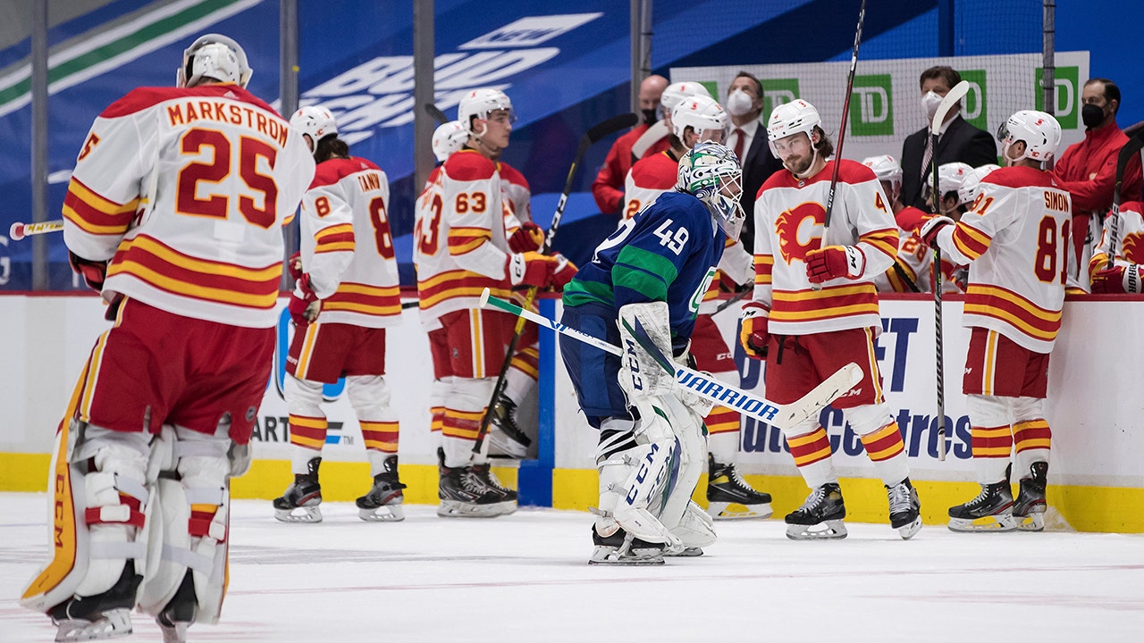 Lindholm's OT goal lifts Flames past Canucks 6-5