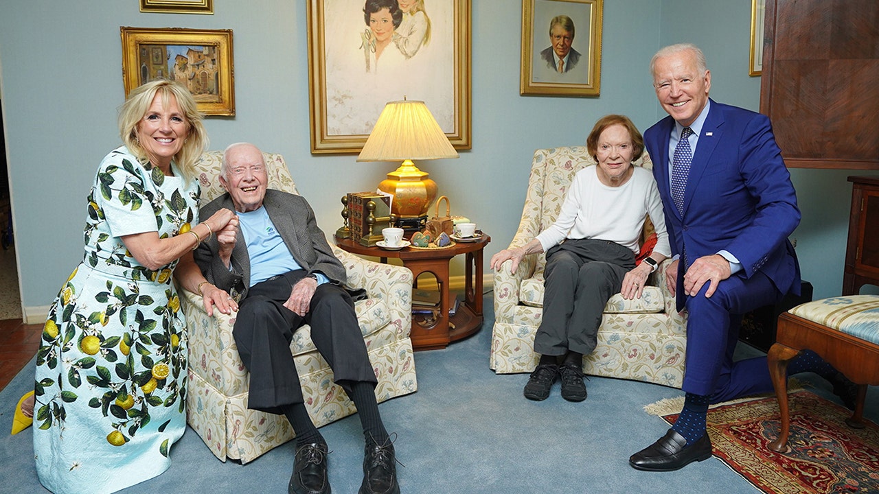 Bidens appear to tower over Jimmy and Rosalynn Carter in 'dollhouse' photo