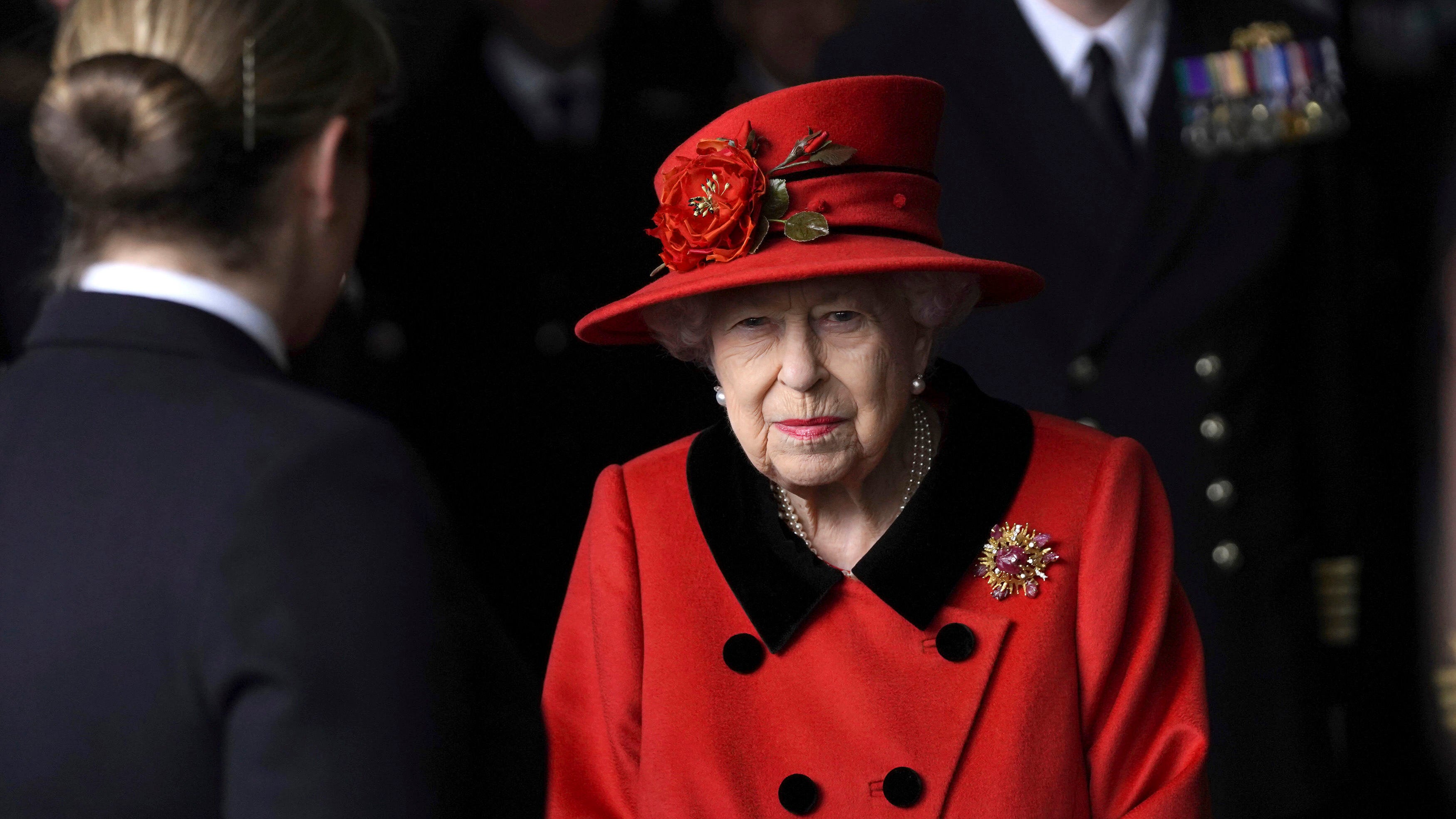 Queen Elizabeth pays tribute to Prince Philip while visiting navy carrier