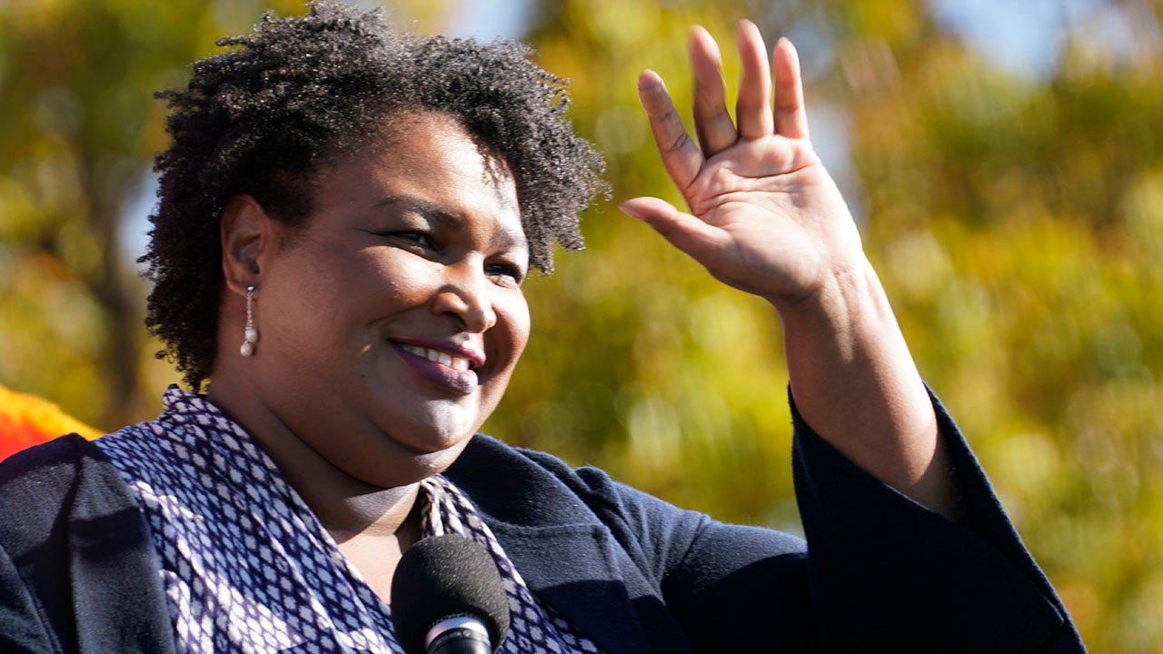 Stacey Abrams receives backlash for posing maskless with room full of young masked children