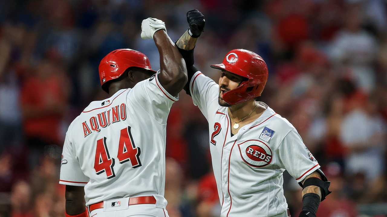 Castellanos hits slam as Reds rally past Phillies 12-4