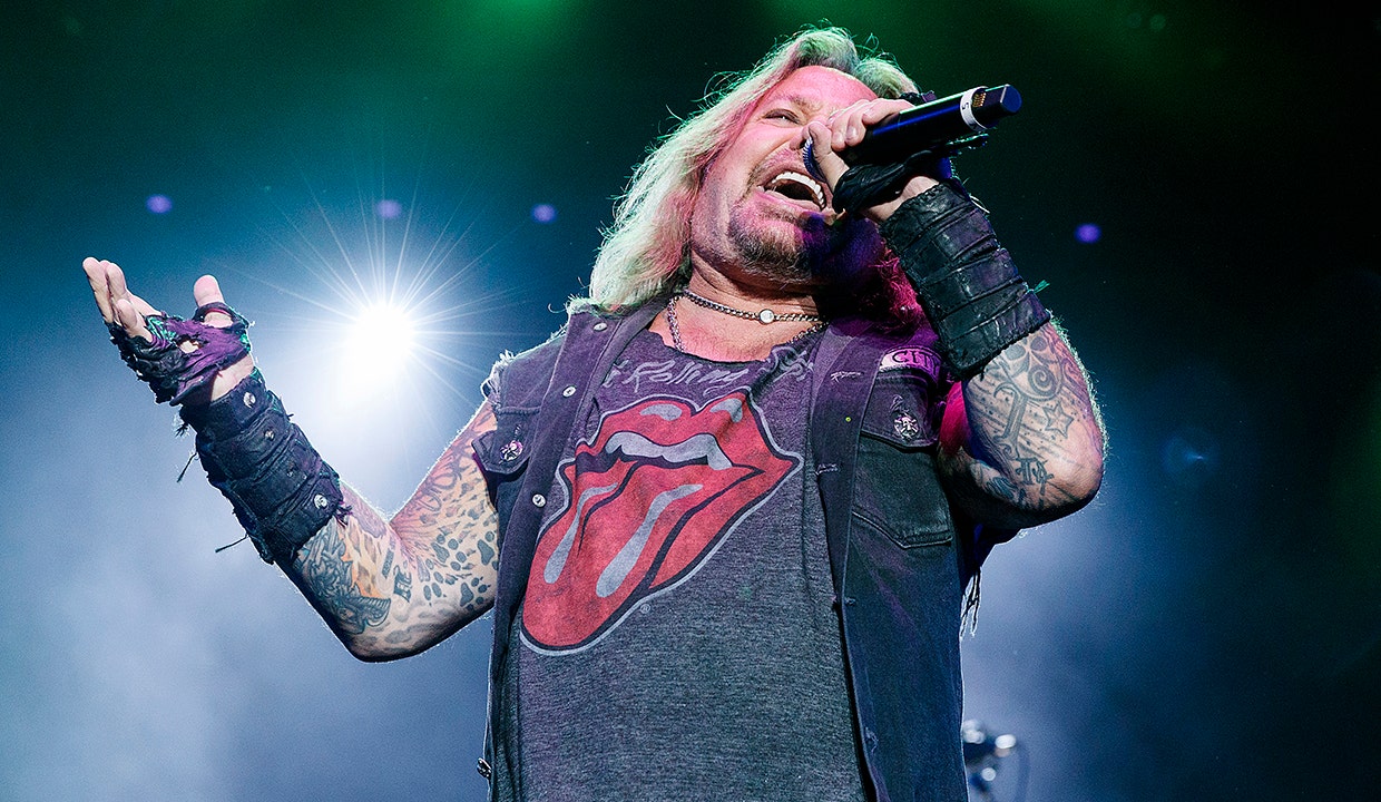 Mötley Crüe singer Vince Neil transported to hospital after falling off stage during concert: report