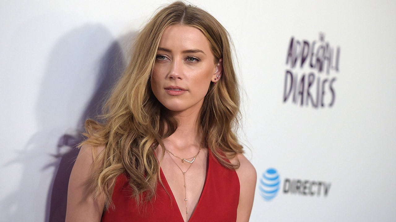 Amber Heard makes it clear she's 'the mom and the dad' in post featuring her baby girl