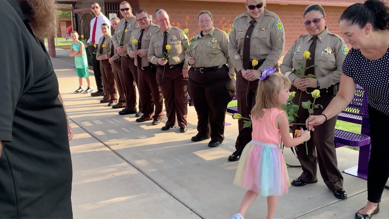 Arizona deputies escort late officer's daughter to first day of school