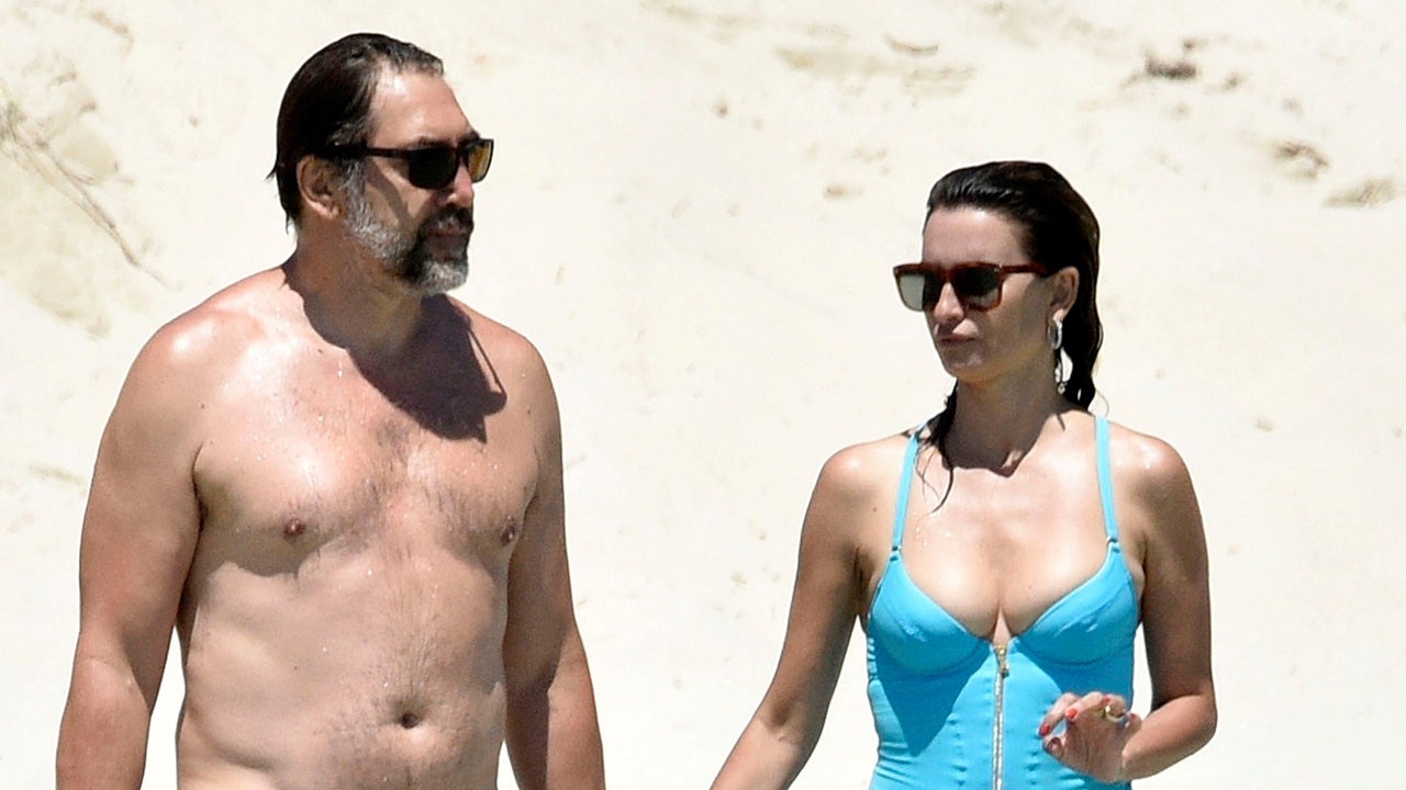 Penelope Cruz, 47, rocks a plunging swimsuit while enjoying a beach day with Javier Bardem in Sardinia