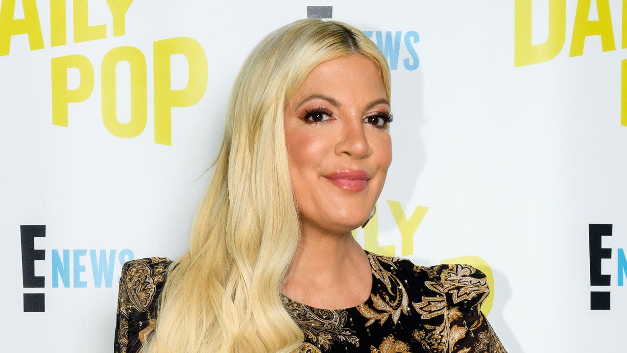Tori Spelling says she plans to replace breast implants after 20 years: ‘I need a lift’