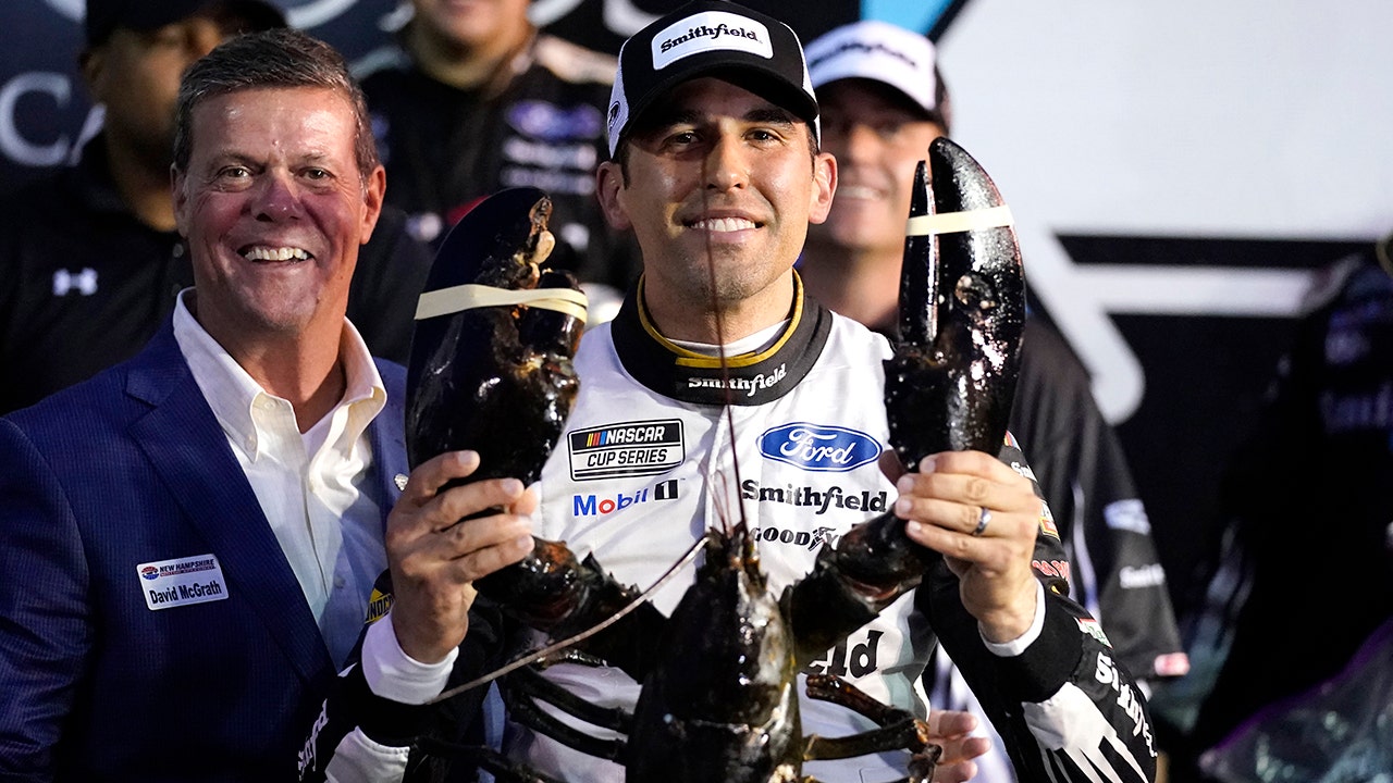 Aric Almirola wins wet and dark New Hampshire NASCAR Cup Series race