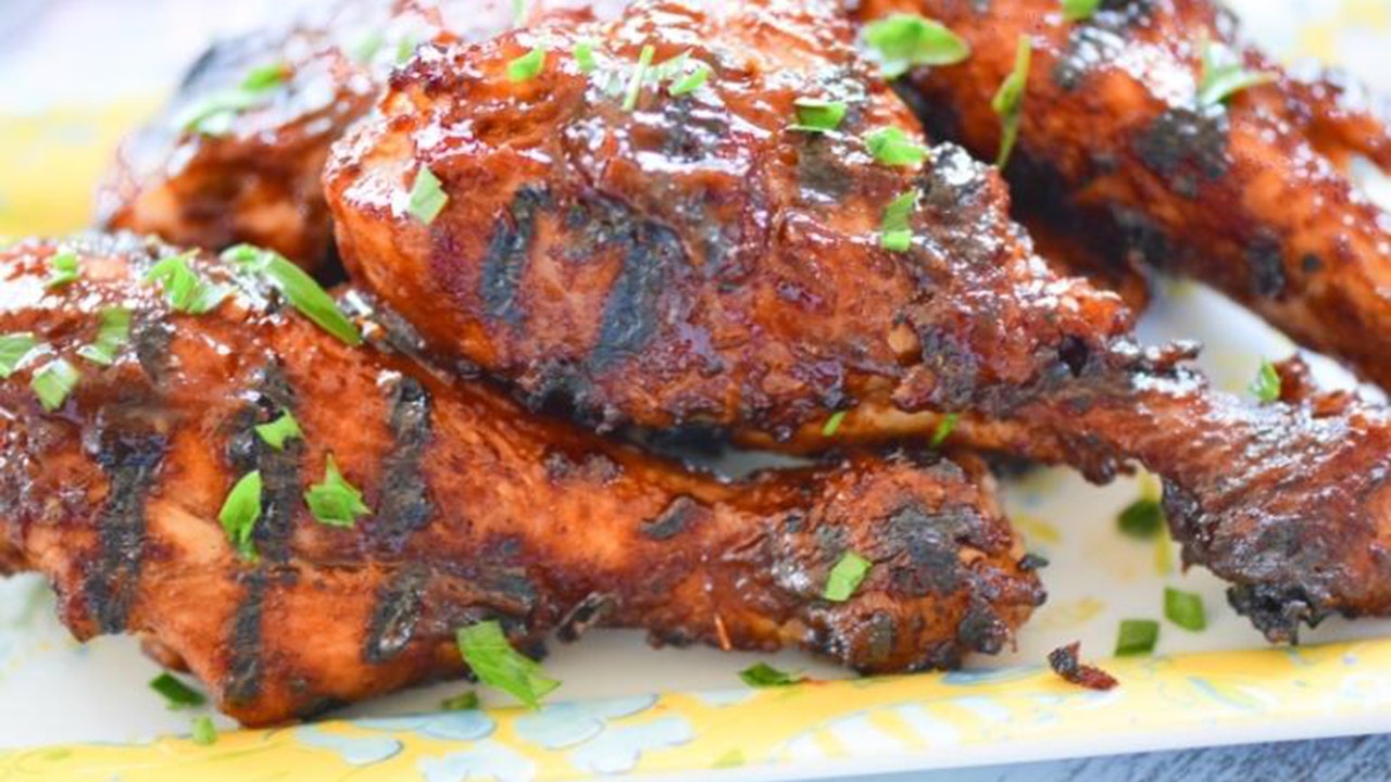 Barbecue chicken drumsticks smothered in chipotle-beer barbecue sauce for July 4: Recipe
