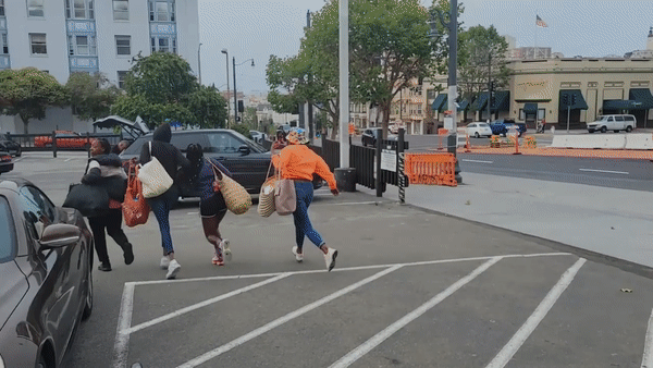 A witness captured a group of women running out of a San Francisco CVS Pharmacy with bags allegedly stuffed full of stolen items as a spree of retail thefts continue to plague the city. 