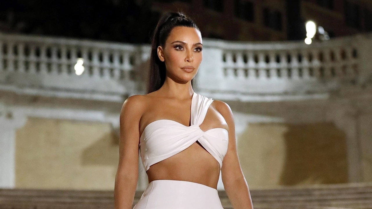 Kim Kardashian wows in revealing white dress on Spanish Steps after facing flack for sexy getup at Vatican