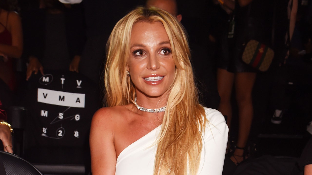 Britney Spears goes topless again in denim shorts for new Instagram video