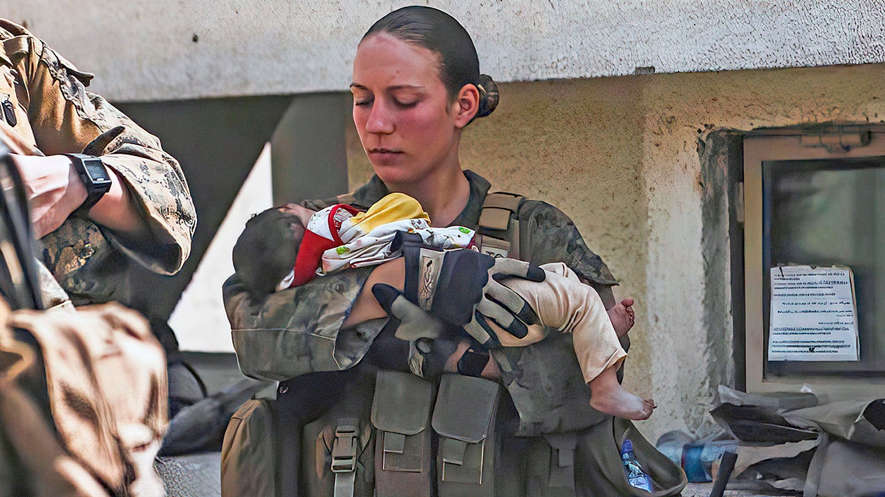 Father of Marine seen cradling Afghan infant reacts to daughter’s death after Kabul blast: ‘Just my baby’