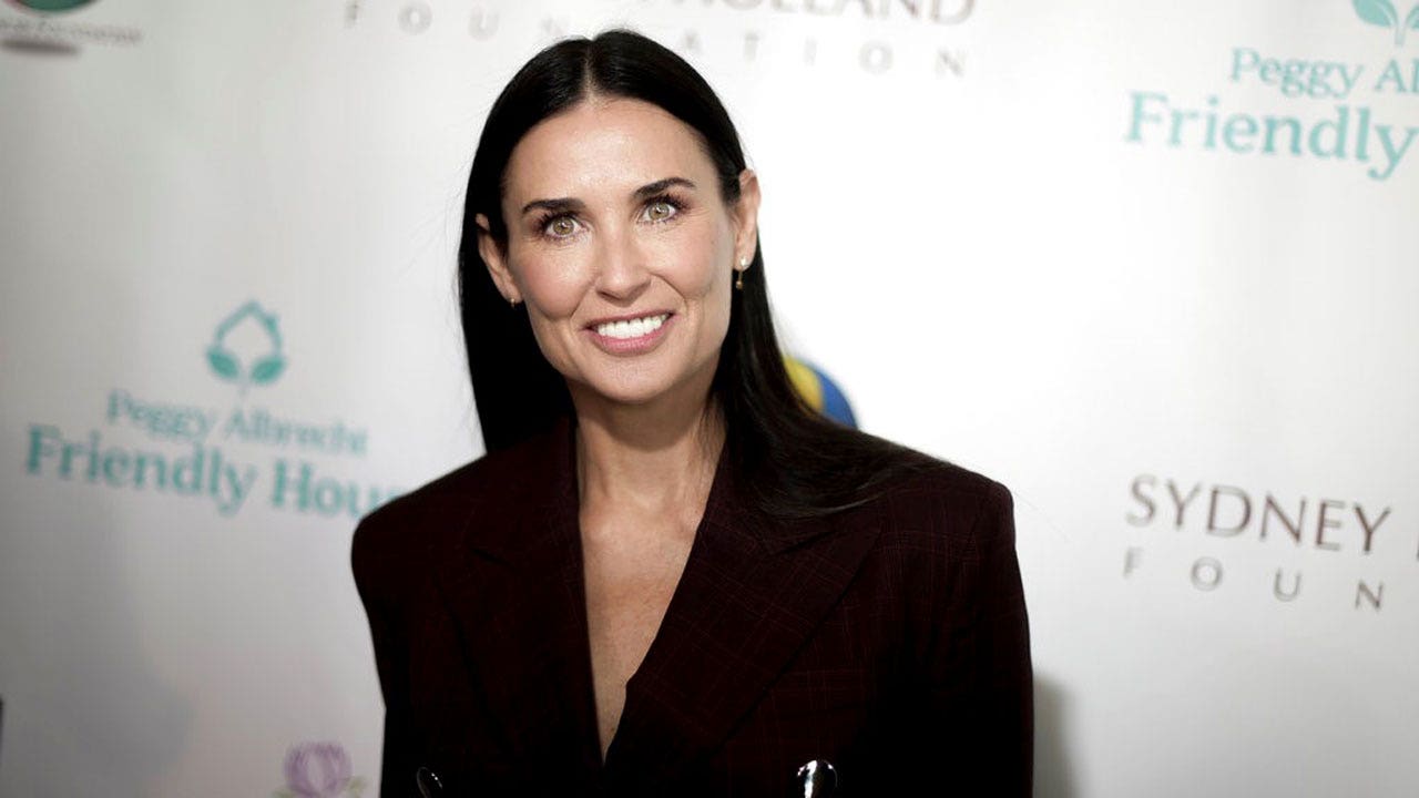Demi Moore sizzles in one-piece swimsuit in honor of 'red hot summer'