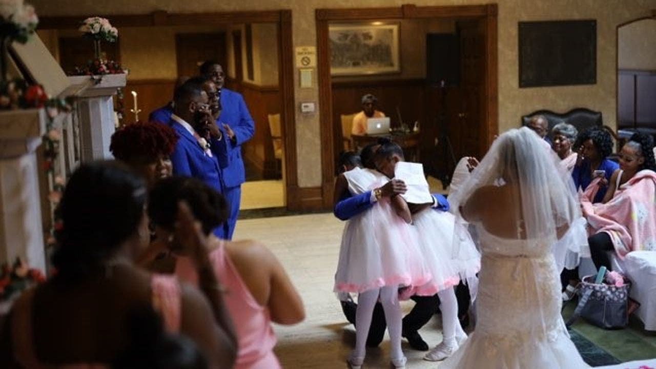Groom surprises stepdaughters with adoption proposal at wedding: 'It was priceless'