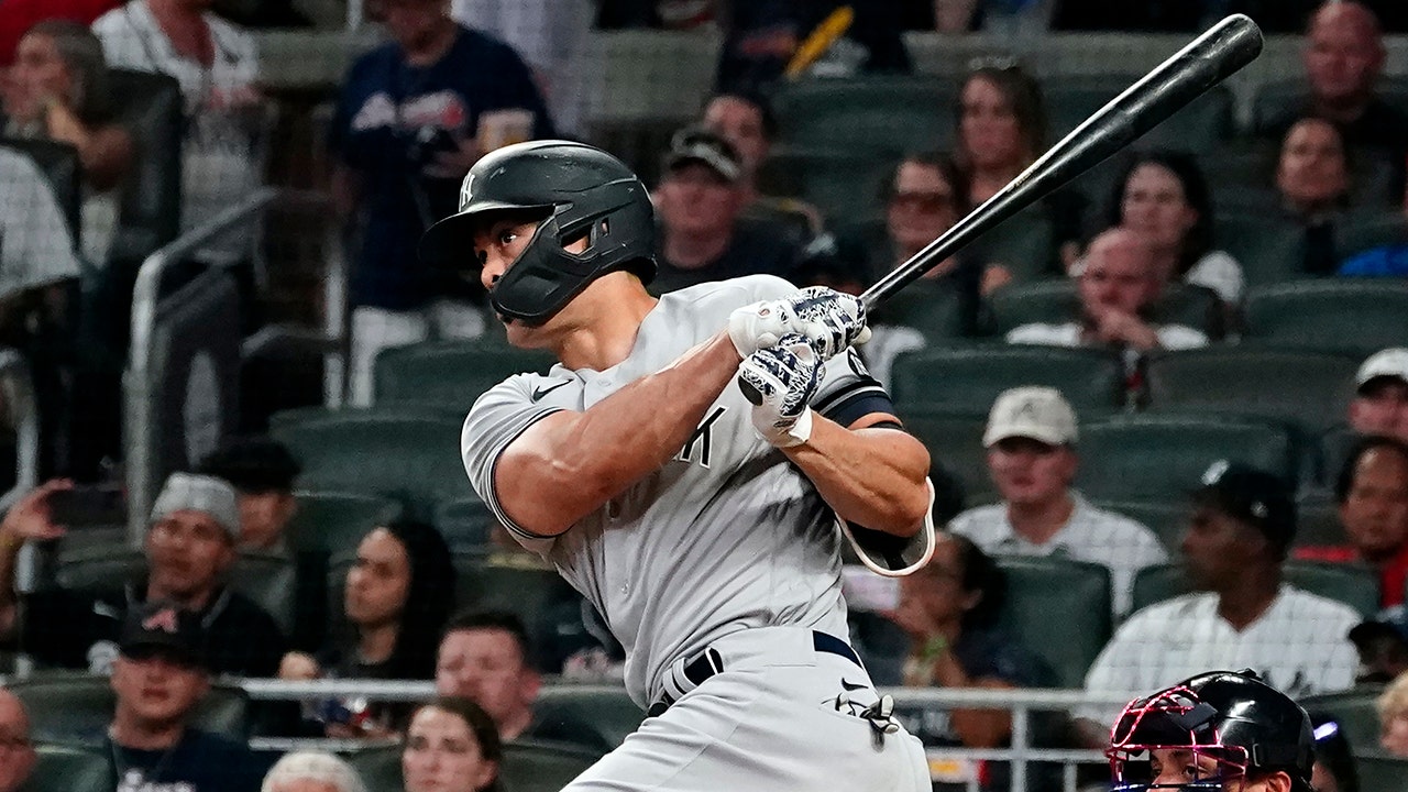 Yankees hit three home runs to hold off Braves for 11th straight win