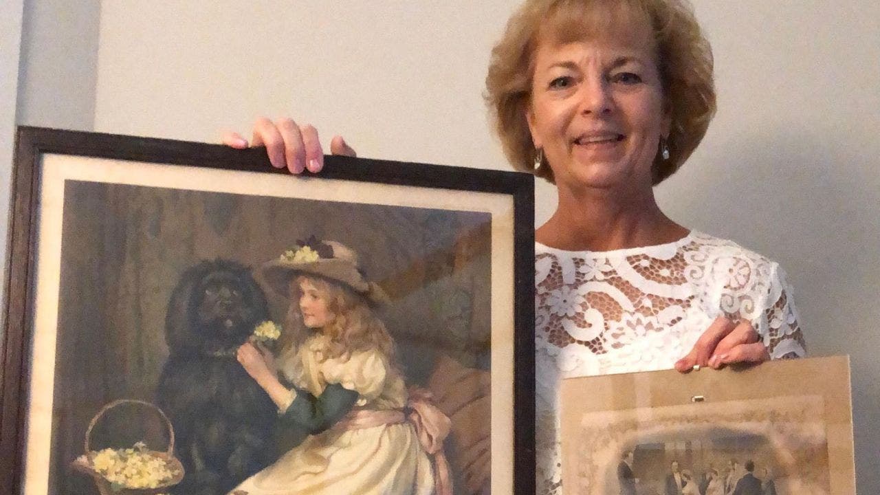 Thrift shop reunites family with 1870s marriage certificate hidden behind a painting