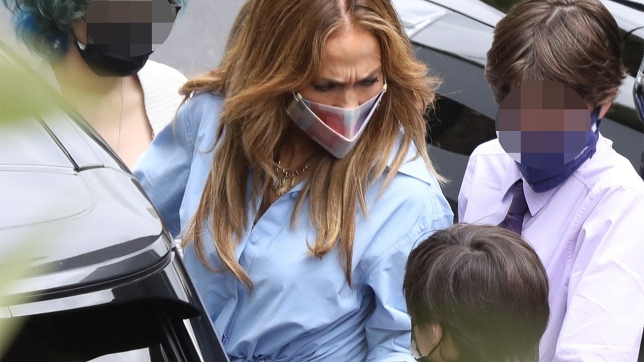 Jennifer Lopez appears to scold one of her children while out with Ben Affleck