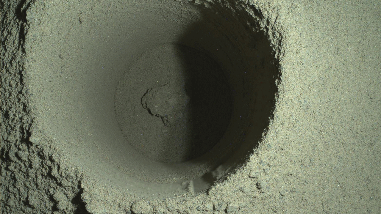 This composite image of the first borehole drilled by NASA's Perseverance rover on Mars was generated using multiple images taken by the rover's WATSON (Wide Angle Topographic Sensor for Operations and eNgineering) imager. The borehole is 1.06 inches (2.7 centimeters) in diameter. A subsystem of the SHERLOC (Scanning Habitable Environments with Raman & Luminescence for Organics & Chemicals) instrument, WATSON can document the structure and texture within a drilled target, and its data can be used to derive depth measurements. The image was taken on the mission's 165th Martian day, or sol, at night in order to reduce self-shadowing within the borehole that can occur during daylight imaging. Some of WATSON's white LEDs illuminated the borehole. NASA's Jet Propulsion Laboratory built and manages operations of Perseverance and Ingenuity for the agency. Caltech in Pasadena, California, manages JPL for NASA. WATSON was built by Malin Space Science Systems (MSSS) in San Diego and is operated jointly by MSSS and JPL.