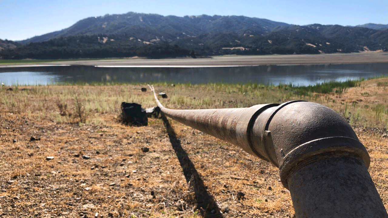 A pipe runs to Lake Mendocino near Ukiah, Calif., on Wednesday, Aug. 4, 2021.