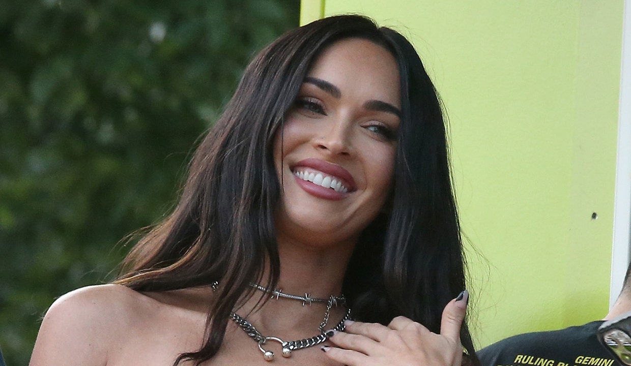 Megan Fox shares pics of herself running errands in revealing electric bodysuit, heels: 'Let’s talk about it'