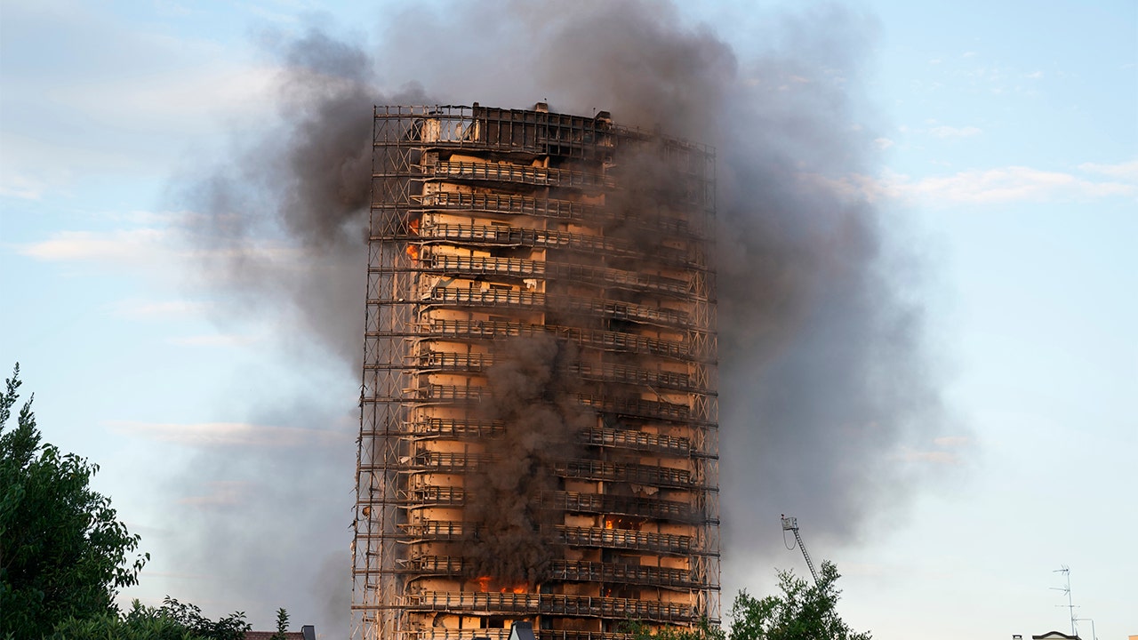 Flames consume high-rise in Milan; residents evacuated