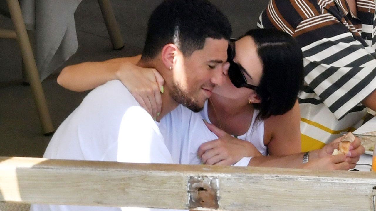 Kendall Jenner and beau Devin Booker spotted showing rare PDA while on romantic Italian getaway