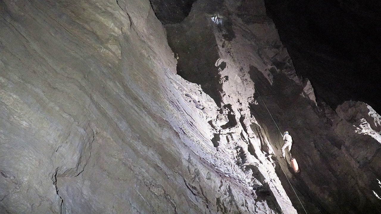 Rescuers prepare to recover body of Russian climber discovered in world's deepest cave