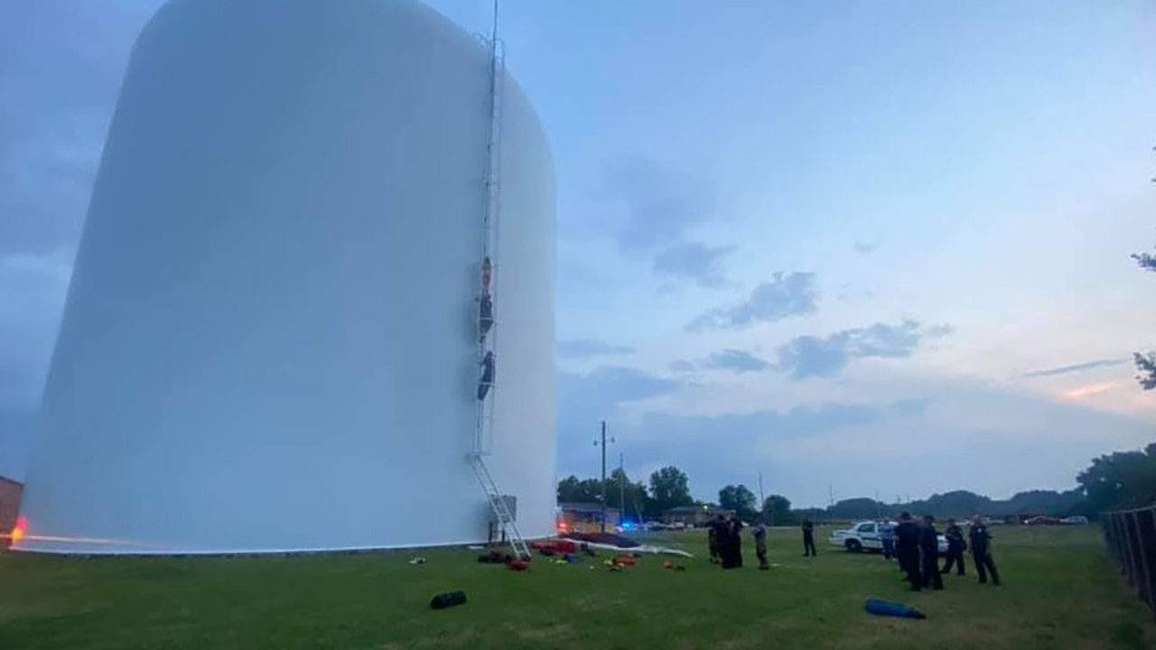 Alabama firefighters rescue woman found swimming in 70-foot-high water tank