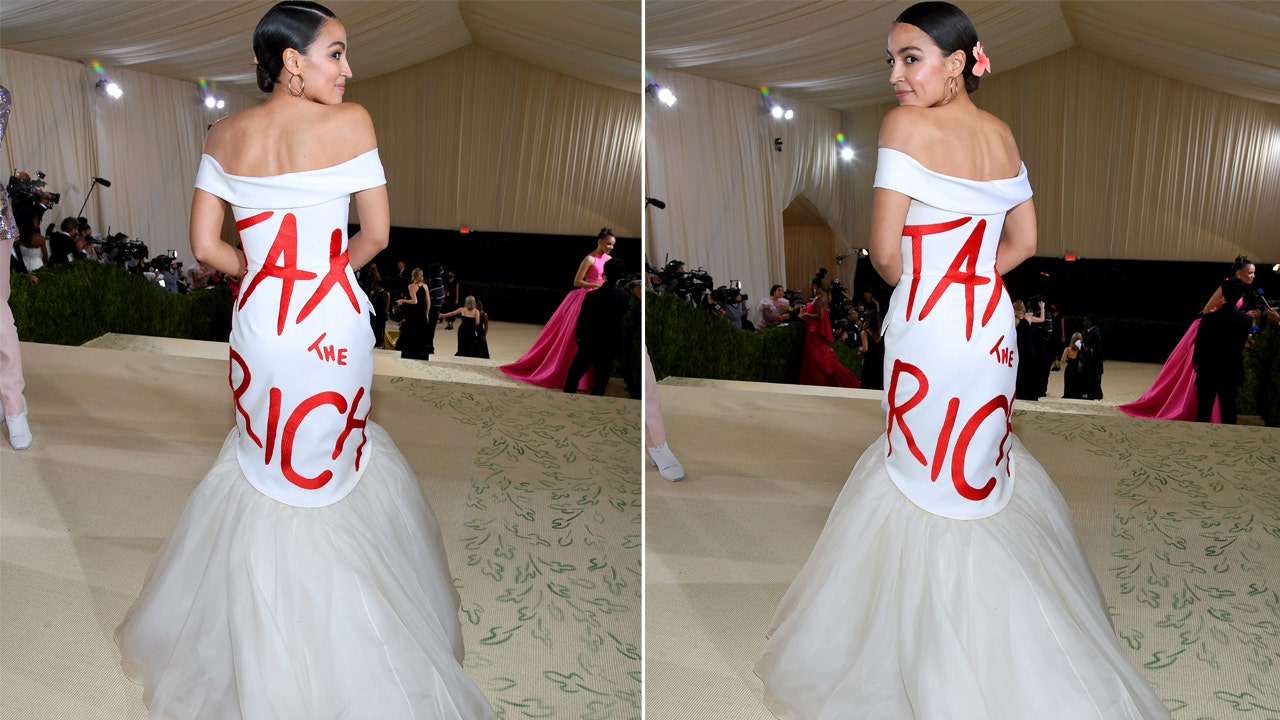 AOC's Shocks Crowd with Tax the Rich Gown at Met Gala 2021 - Loud News Net