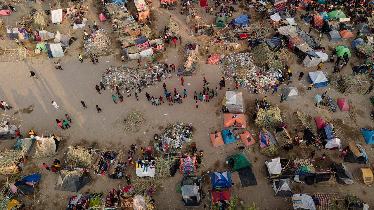 Thousands of Haitian migrants camped in Texas town being let into US, report says