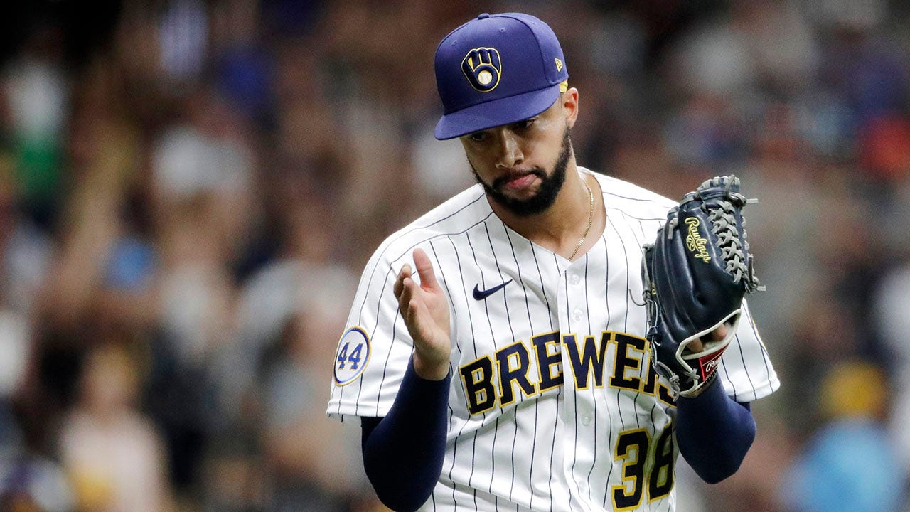 Brewers’ Devin Williams breaks throwing hand after punching wall will miss playoffs – Fox News