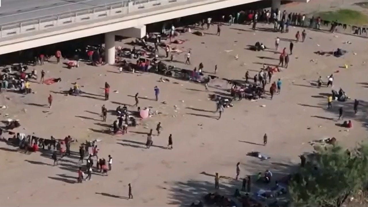 Drone footage shows thousands of migrants under bridge in Del Rio, Texas as local facilities overwhelmed