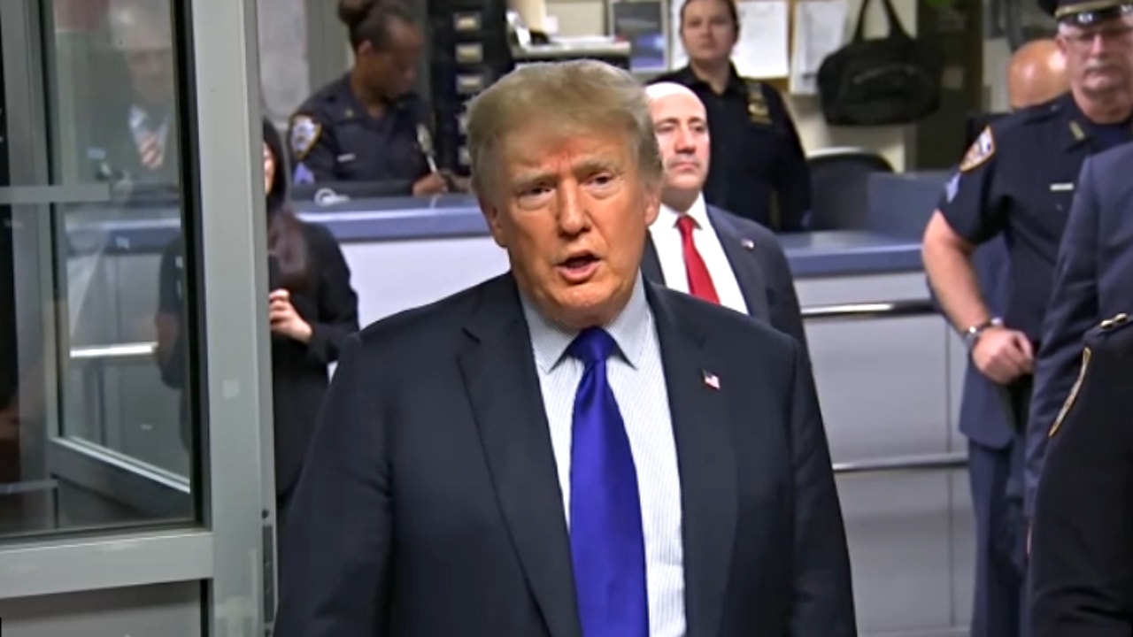 Trump tells NY cop 'I think you're going to be happy' when asked if he'll run again in 2024