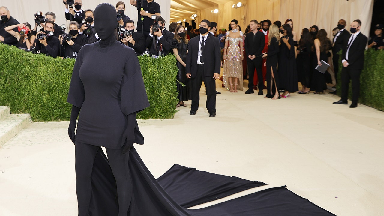 Kim Kardashian walks 2021 Met Gala in head-to-toe black Balenciaga ensemble