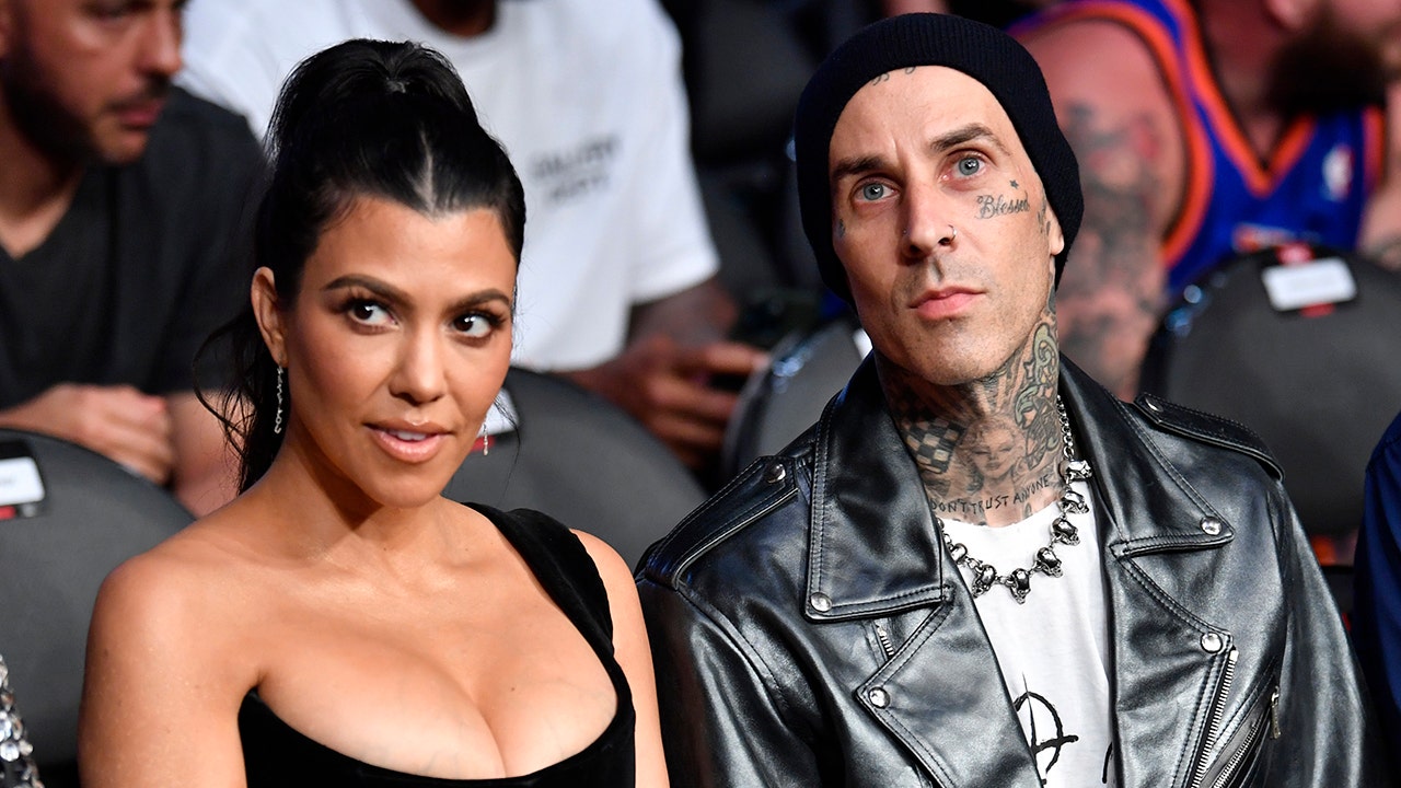 Travis Barker, Kourtney Kardashian pack on the PDA in front of Eiffel Tower: 'Forever isn't long enough'