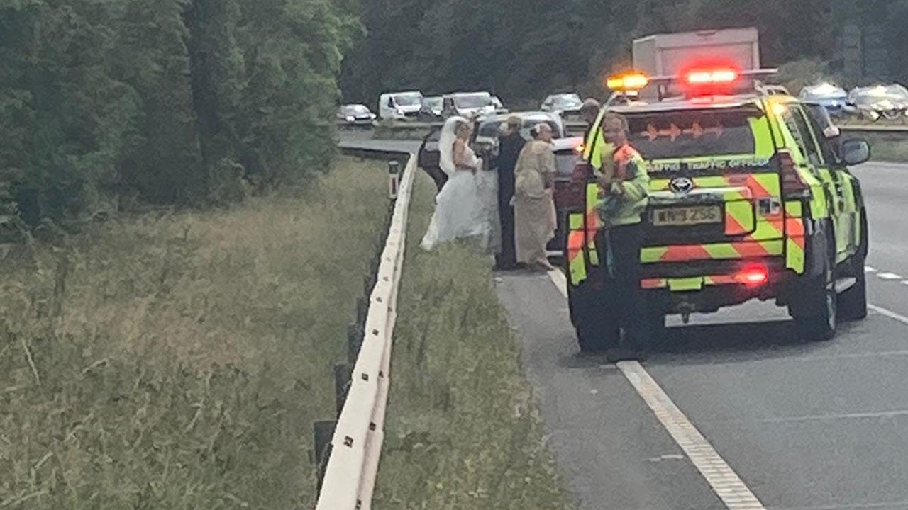 Police rescue bride after her car breaks down on the way to her wedding