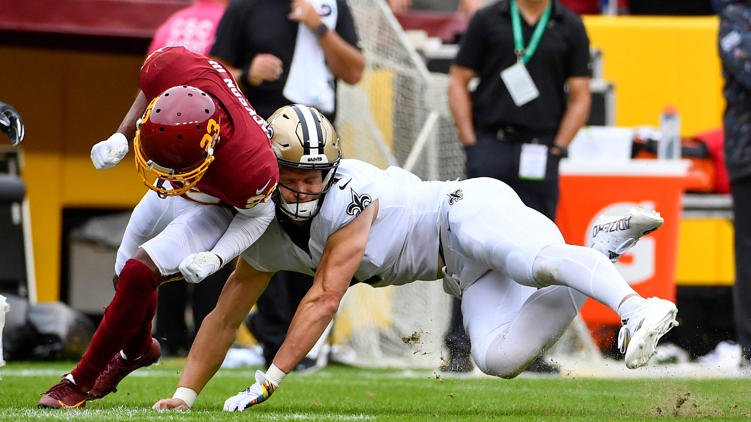 Saints' Taysom Hill carted off the field at Washington after