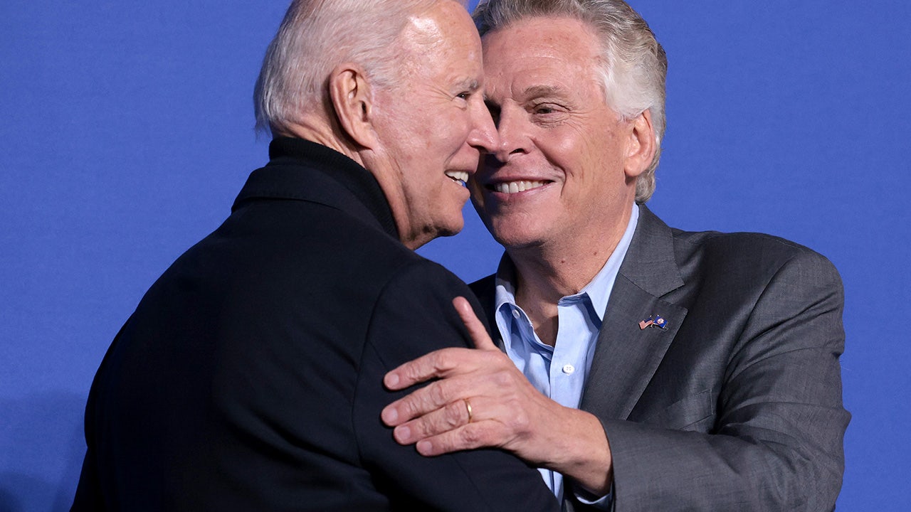 McAuliffe dances onstage next to Biden and internet chimes in