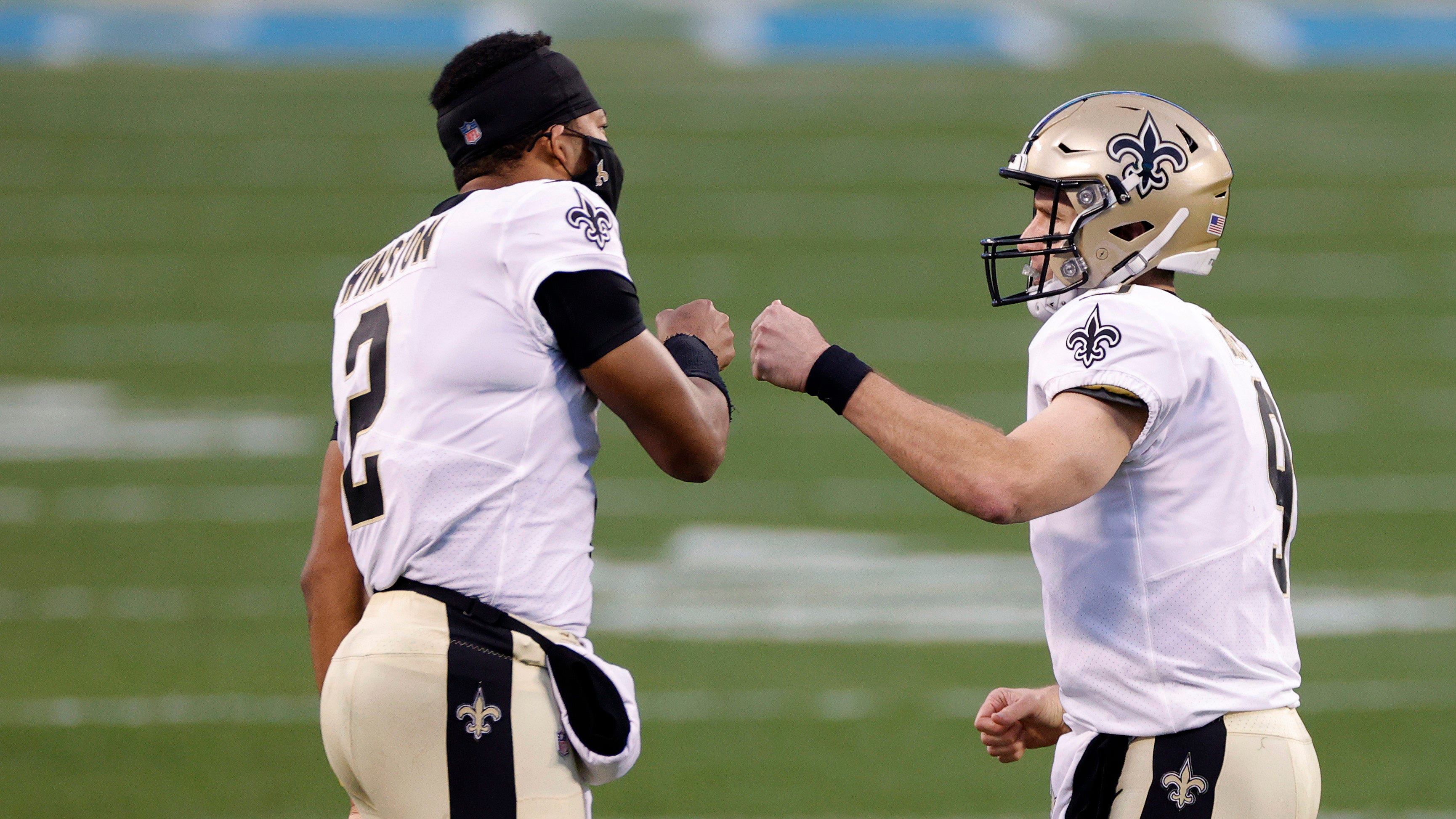 New Orleans Saints quarterback Jameis Winston (2) hands off to