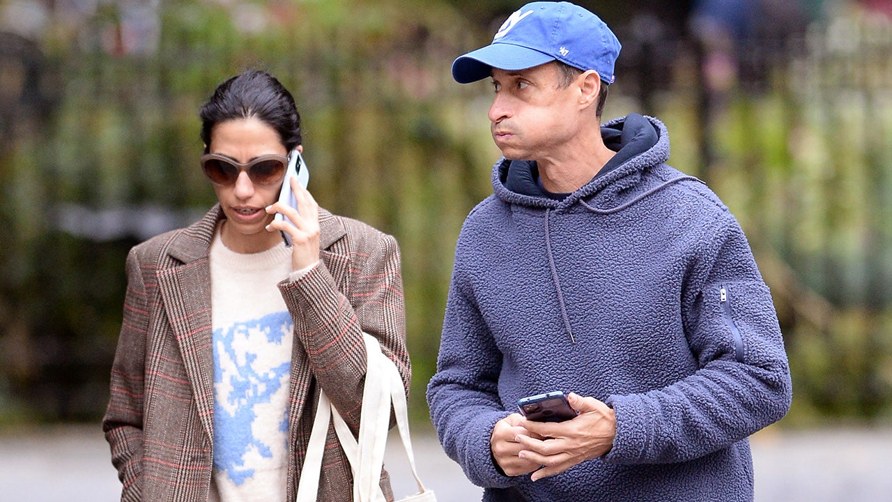 Huma Abedin and Anthony Weiner spotted together in rare photos strolling in NYC ahead of book release