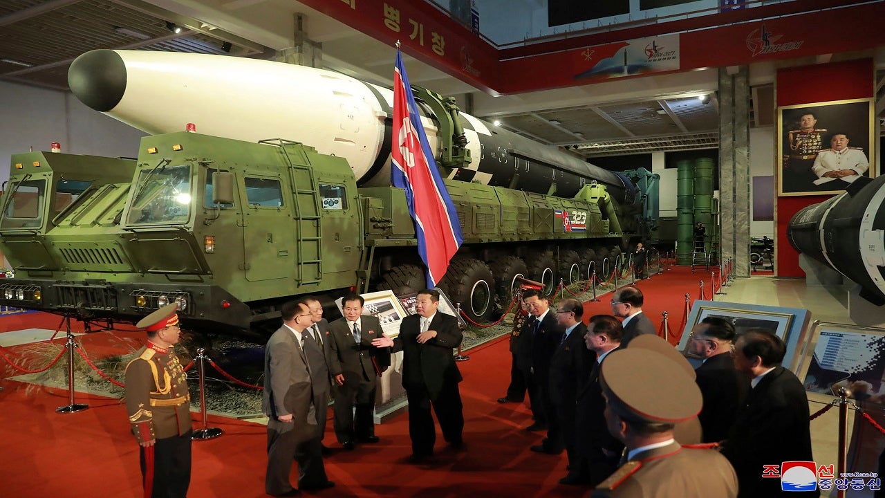 Kim vows ‘invincible’ North Korea military during rare exhibition of weapons